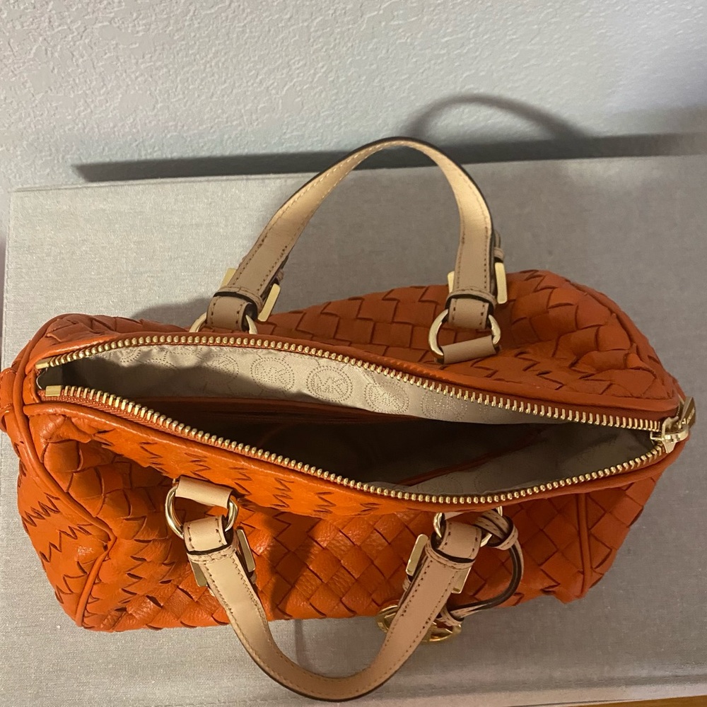 Michael Kors leather bag. Matches with everything.